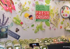 The booth of Fresh Origins. The company produces Microgreens, Petite®Greens, Edible Flowers, Tiny Veggies™ as well as Herb, Flower & Fruit Crystals®.